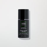 Skin care product bottle labeled 'Tiege Hanley Look Good Drops' on a light gray background
